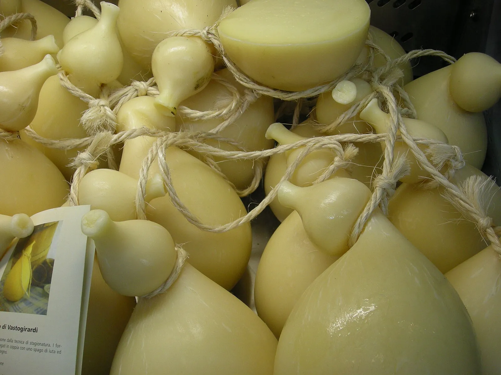 Gourd-shaped caciocavallo cheeses tied in pairs with string